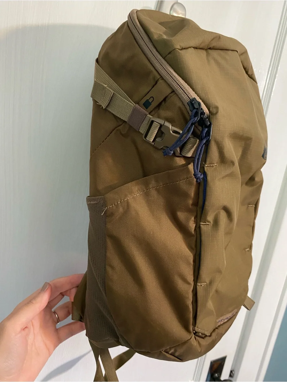 REI brown backpack